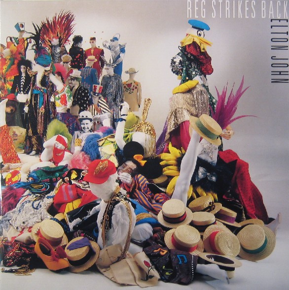 Elton John ‎– Reg Strikes Back